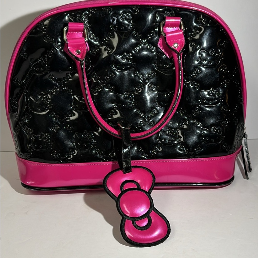 Hello Kitty by Loungefly purse. Preowned but in very good condition.